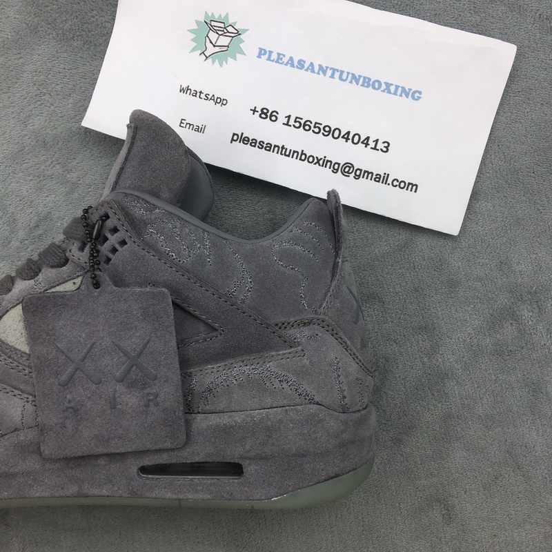 Authentic KAWS x Air Jordan 4 “Cool Grey”